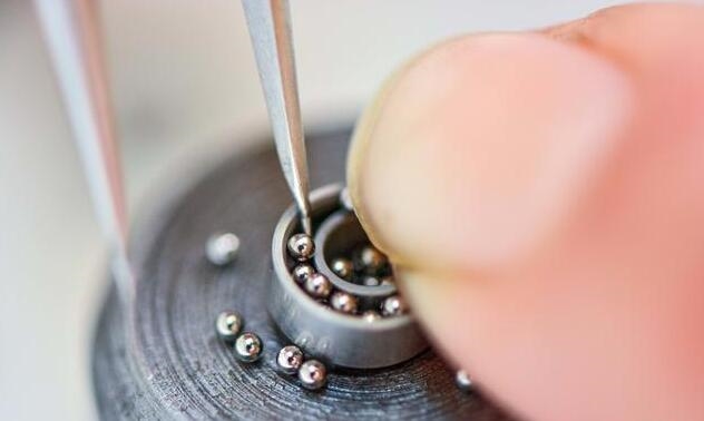 在机械设计中轴承与轴的配合,该用什么公差等级最合适